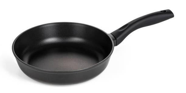 istock Black frying pan isolated on white background 1336469275