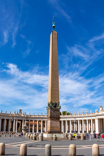 Rome, Italy - August 2, 2021: Ancient Egyptian obelisk in St. Peter's Square (Obelisco Piazza San Pietro) in Vatican city in Rome, Italy