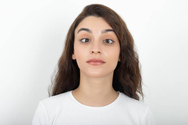 istock Young woman squinting her eyes 1336471463