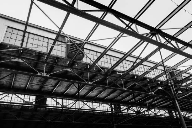 istock Steel girders and factory windows under open sky 1336472710