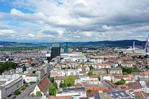 Basel City panoramic wiev over the districts located at the right side of the Rhine river. The high angle image was captured during summer season.