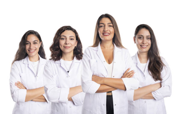 istock Female women with white uniform are standing 1336478305
