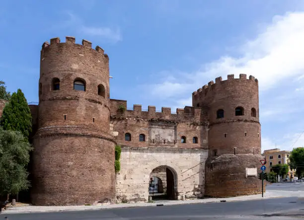 The Porta Asinaria, a gate in the Aurelian Walls of Rome,Italy. It was a simple gate,but Honorius added two semi-cylindrical towers to increase its resistance to the probable attacks of enemies