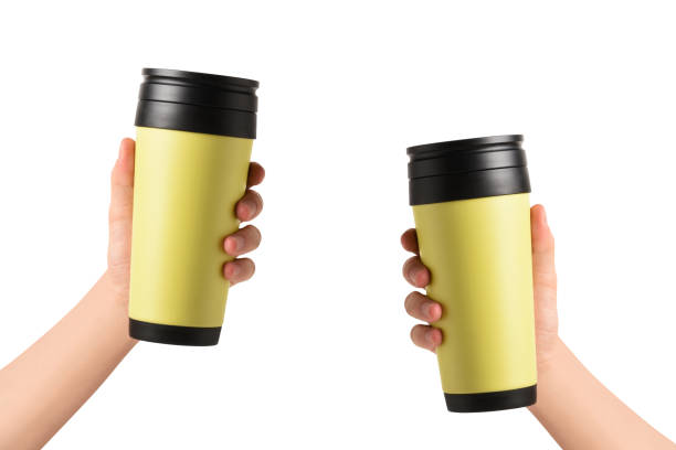 istock Men hands holding insulated drink container, travel mug (Clipping Path) on the white background 1336480888