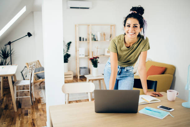 istock Portrait of a young freelancer working from her home office 1336481360