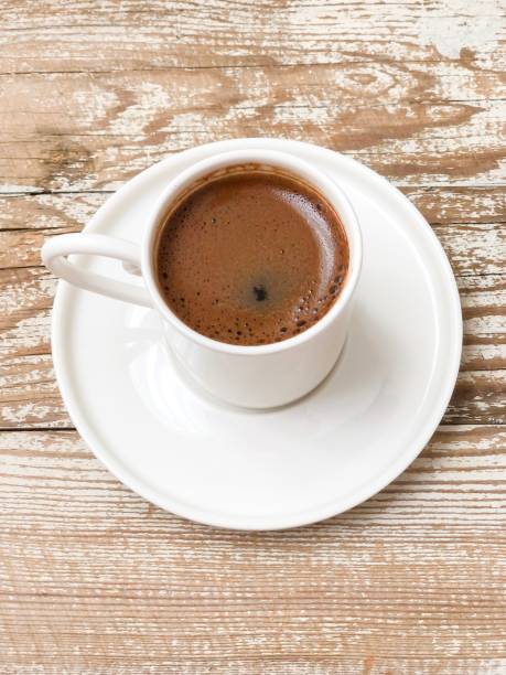 istock a cup of coffee on the wooden table 1336482505