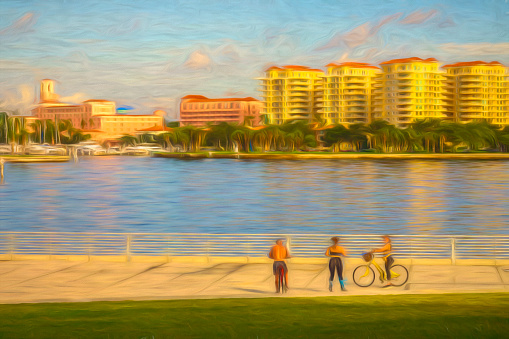 Abstract of three young adults, two bicyclists and one rollerblader, with view of waterfront park, high-rises, and marina in St. Petersburg, Florida. Digital painting effect.