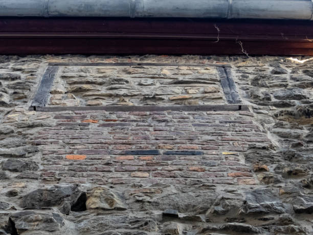 istock View to old stone house wall 1336483552