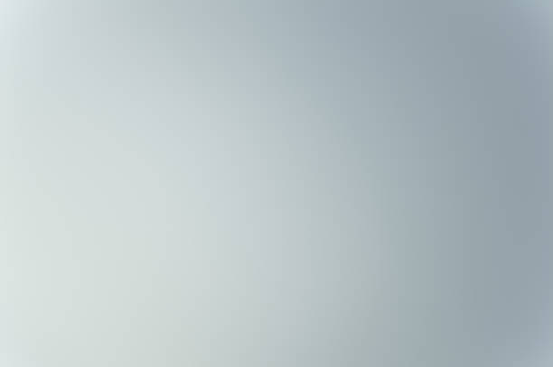istock abstract gray background with a gradient from light to dark. From pearl gray to gray window color. texture for design. 1336486679