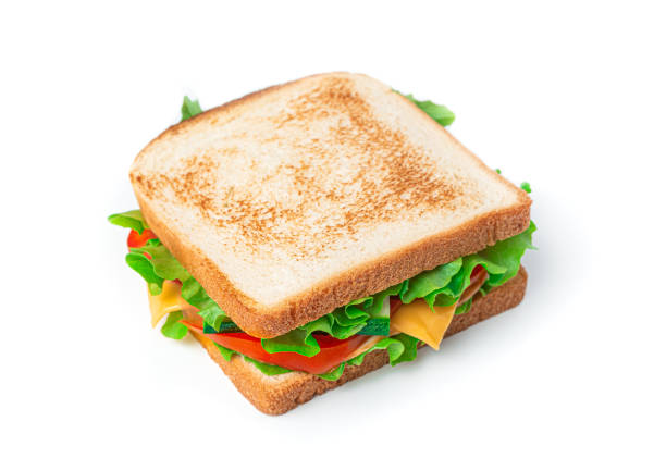 istock Sandwich with cheese, turkey and fresh vegetables on a white background 1336488307