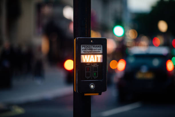 istock Pedestrian button indicating wait in London, UK 1336492234