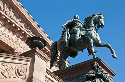 Equestrian statue of Frederick William IV, King of Prussia.  \nThe statue is located on the stairway in front of the “Alte Nationalgalerie” in downtown Berlin.  The bronze sculpture was created between 1875 and 1886 by Alexander Calandrelli based on a design by Gustav Blaeser.