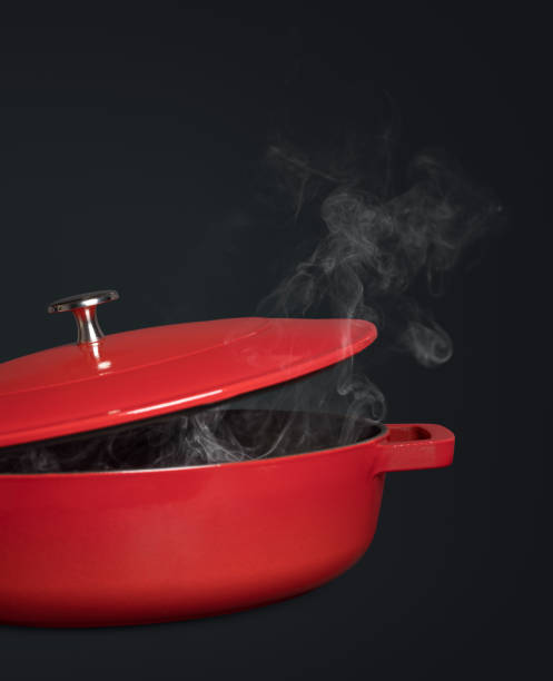 istock Red enameled cast iron pan with steam 1336496989
