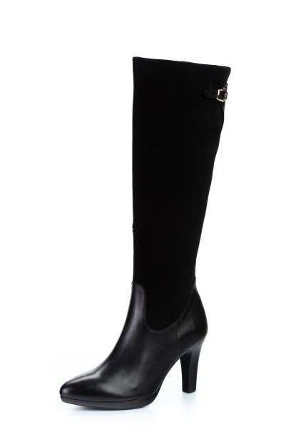 istock Woman high knee leather boots isolated on white background 1336497495