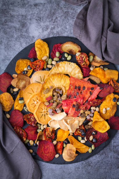 istock Dried fruits and vegetables, dehydrated persimmon, watermelon, pineapple, beetroot chips 1336498424