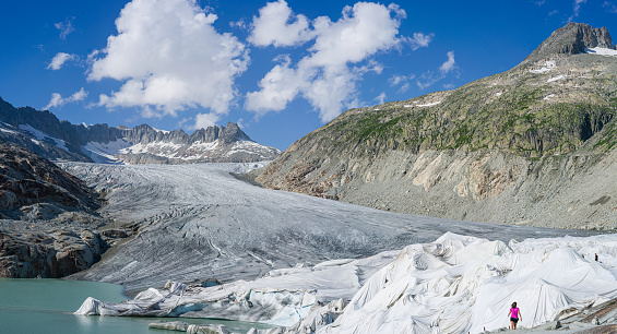 Switzerland , 2021 August 14. View of the lake of the Rhonegletcher Glacier in Switzerland. A lot of tourist visited this famous place.