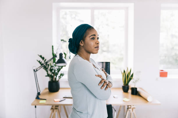 istock Woman contemplating at work 1336501036
