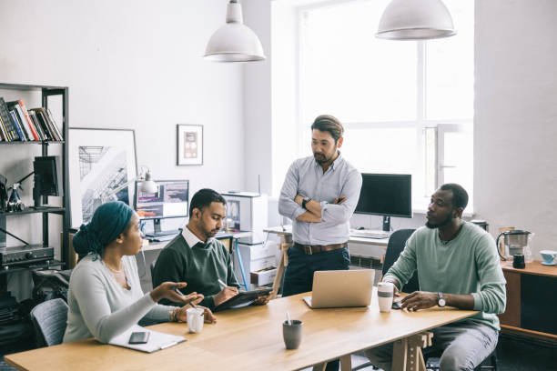 istock Architects having a meeting in the office 1336501074