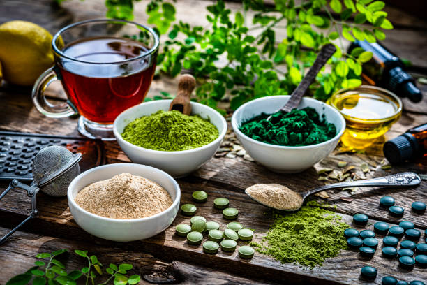 istock Spirulina, Maca and Moringa powder and pills 1336503088