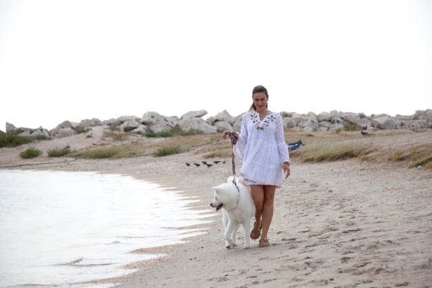 young woman walking her dog