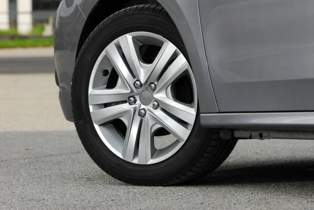 istock Tire and alloy wheel on this passenger car 1336504130