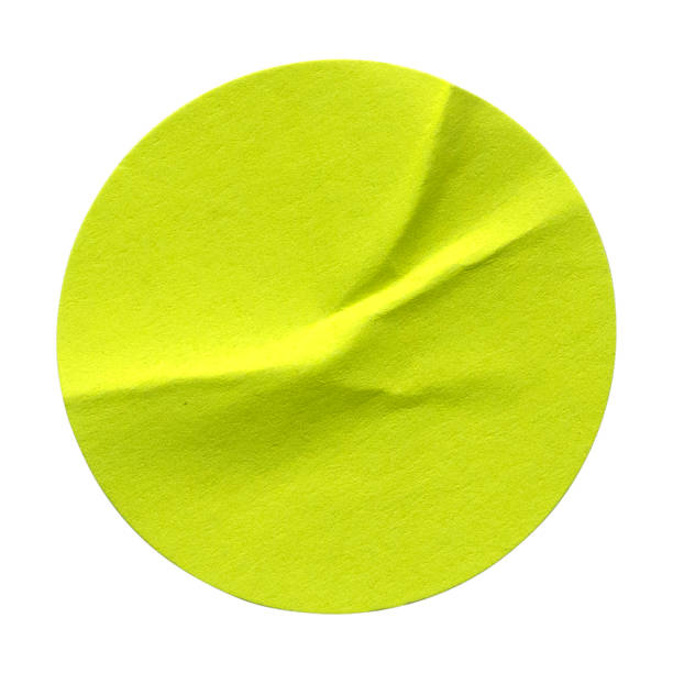istock Green circle paper sticker label isolated on white background. 1336504944