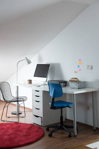 istock modern home interior office working room wooden table in laptop 1336505347