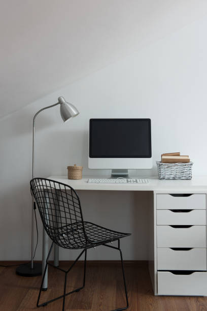 istock modern home interior office working room wooden table in laptop 1336505363