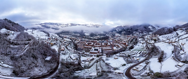 Aerial view of the Asturian town of Blimea under a snowfall, Spain