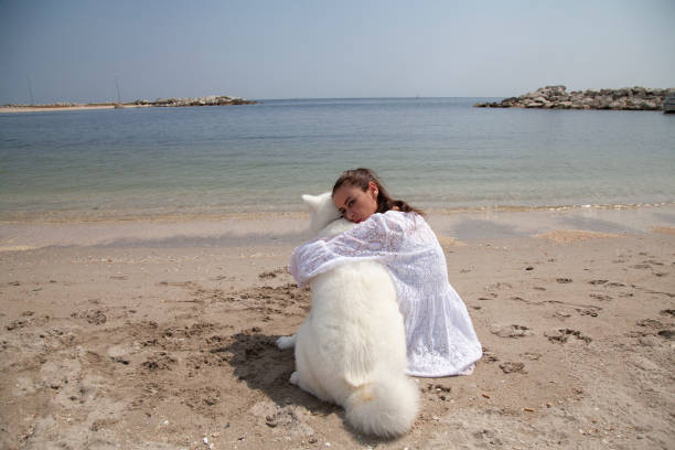 young woman walking her dog