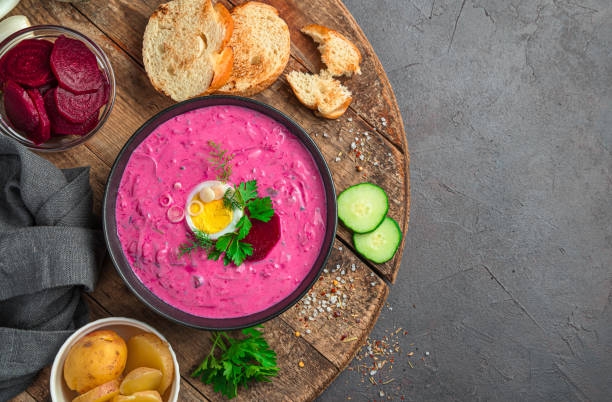 istock Beetroot soup with herbs and egg on the background of ingredients 1336509409