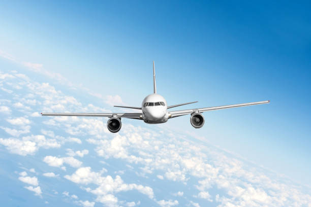 istock Airplane high in the sky at sunset. 1336511552