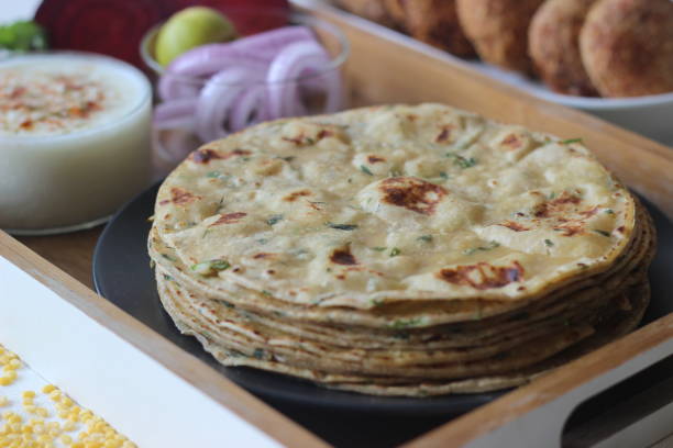 istock A high protein Indian flat bread with whole wheat and lentils. Popularly known as moong dal paratha in many parts of India. Served with vegetarian beetroot cutlets. 1336517500