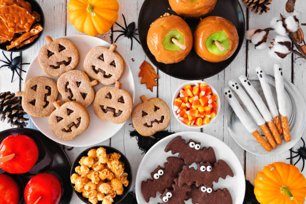 istock Rustic Halloween treat table scene over a white wood background 1336521225