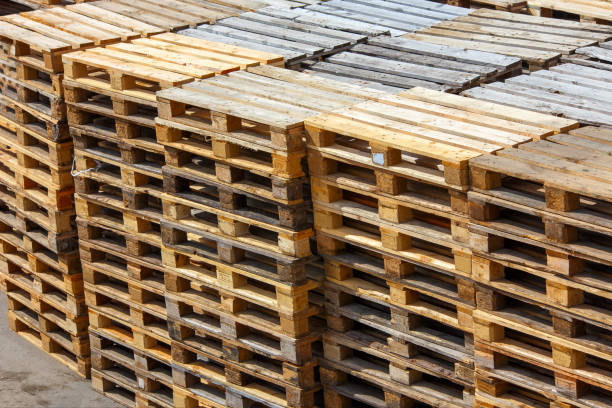 istock used wooden pallet stacks - perspective view from above 1336521273