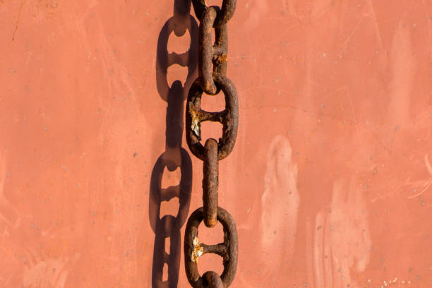 istock Old rusty iron chain on the pier. Metallic background. 1336522546