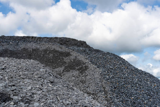 istock Gravel pile and cloudy sky. 1336523151