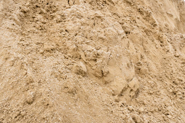 istock Close up to brown sand texture and background. 1336523319