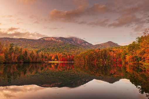 Usa. Foliage landscape and colours. Lake and trees in autumn season, water reflections, relax concept.