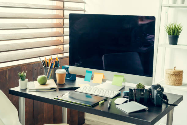 istock Working table of a photographer close up 1336527345