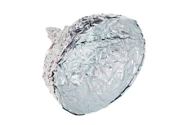 istock Aluminium foil hat isolated on white background, symbol for conspiracy theory and mind control protection. 1336529459