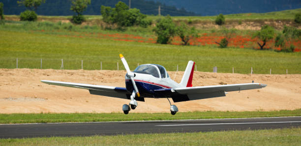 istock Light aircraft landing on aerodrome runway 1336530586