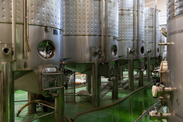 istock Metallic cisterns for processing and fermentating wine in shop 1336530592
