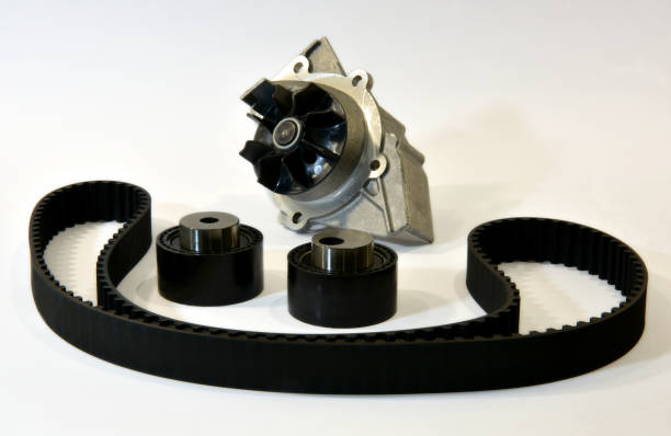 istock The timing belt, rollers and water pump stands on a white background 1336533312