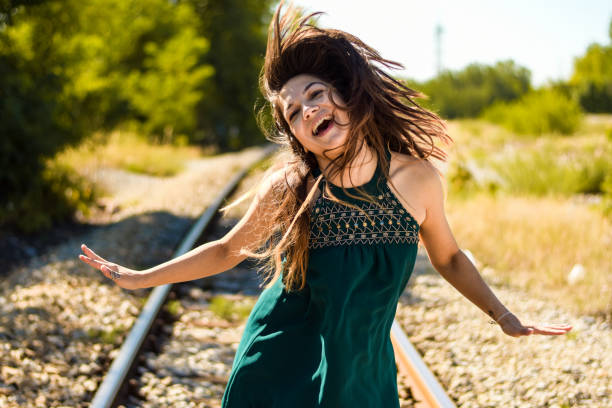 istock Mid woman at the train station 1336534378