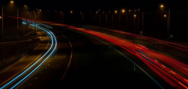 istock lights of cars with night. 1336534549