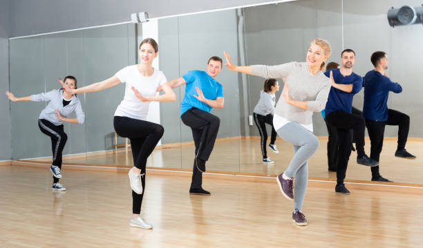 istock Adult people training in dance studio 1336540732
