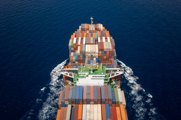 istock Aerial view of a heavy loaded container carrier ship 1336542038