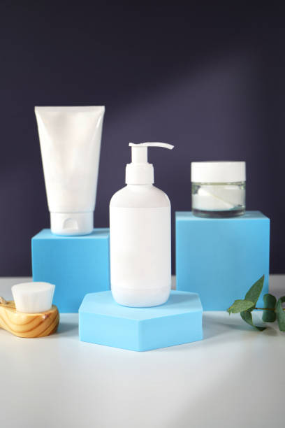 istock Cosmetic skincare blank container mockups in styled setting. 1336547409