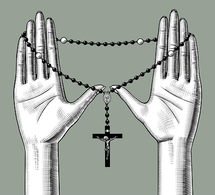 Female palms holding a rosary with a cross. Vintage engraving stylized drawing. Vector illustration